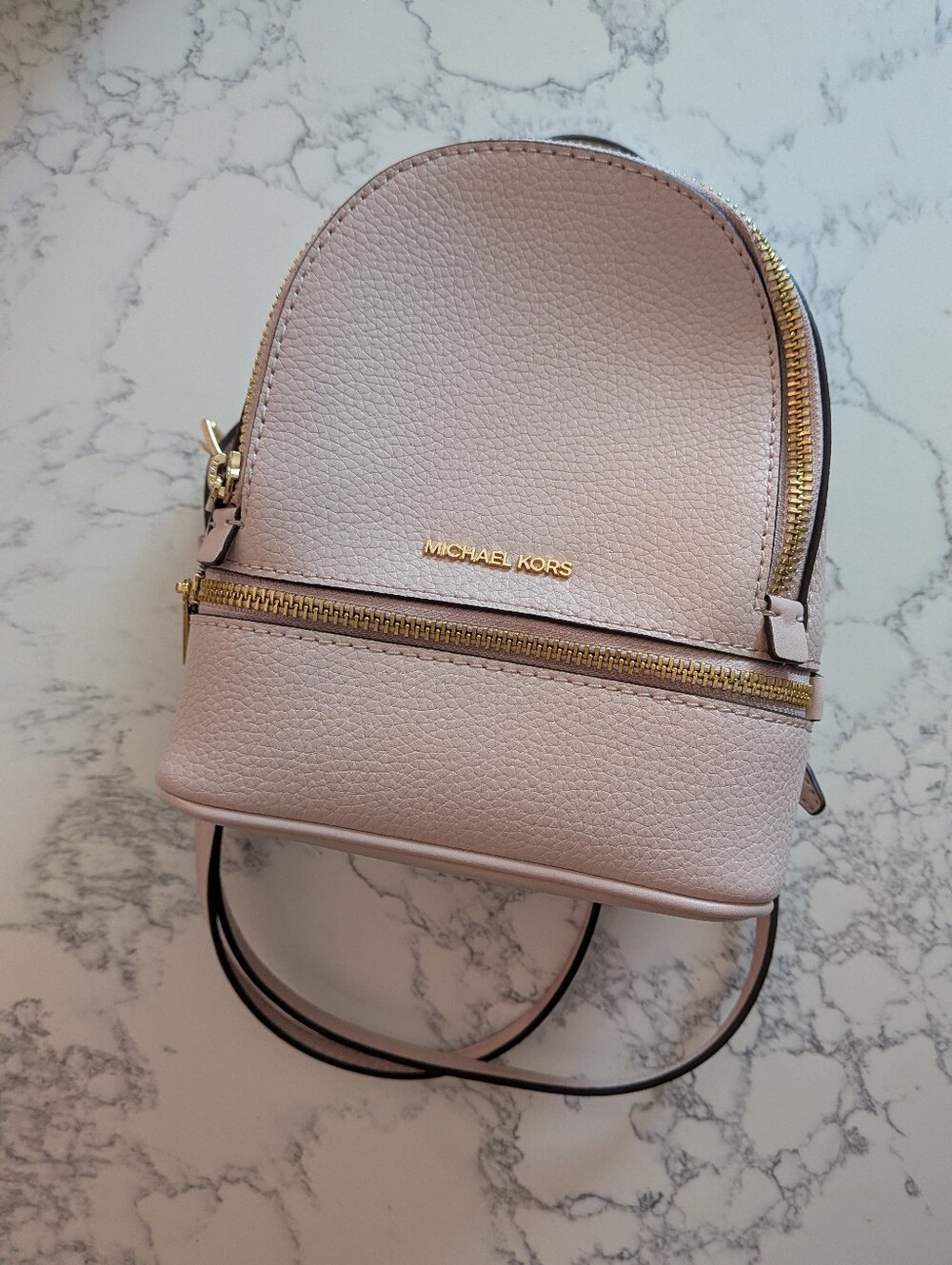 Michael Kors Light Pink Pebbled Leather Mini Backpack with Gold Hardware